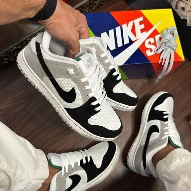 Nike Dunk Low cinza e preto, ângulo 1 de 3
